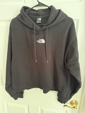The North Face Black Pullover Hoodie with White Logo. Brand new,size XL.